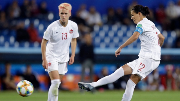 Sophie Schmidt and Christine Sinclair