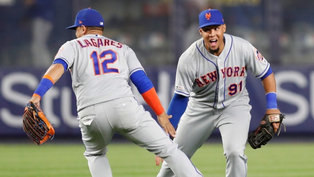 Juan Lagares Carlos Gomez, The Canadian Press Juan Lagares Carlos Gomez