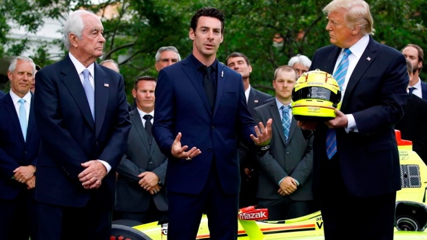 Roger Penske, Simon Pagenaud, Donald Trump, The Canadian Press Roger Penske, Simon Pagenaud, Donald Trump