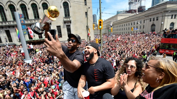 Kawhi Leonard and Drake, The Canadian Press Kawhi Leonard and Drake