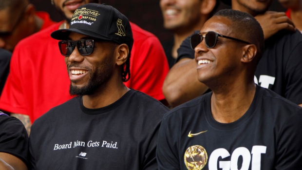 Kawhi Leonard and Masai Ujiri