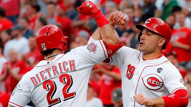 Derek Dietrich, Joey Votto, The Canadian Press Derek Dietrich, Joey Votto
