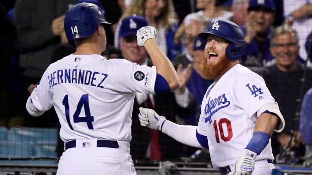 Enrique Hernandez and Justin Turner, The Canadian Press Enrique Hernandez and Justin Turner