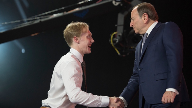 Lassi Thomson and Gary Bettman, The Canadian Press Lassi Thomson and Gary Bettman