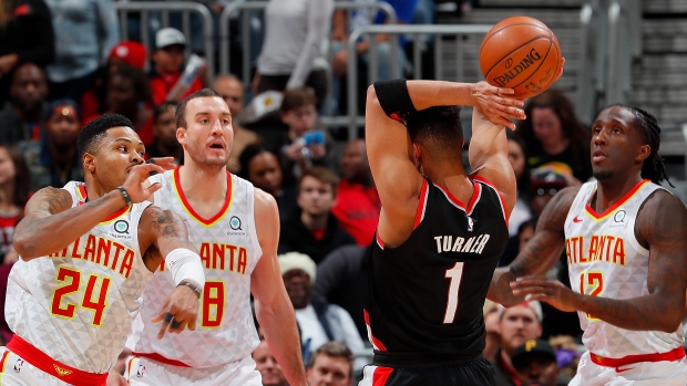 Kent Bazemore strips Evan Turner, Kevin C. Cox/Getty Images Kent Bazemore strips Evan Turner