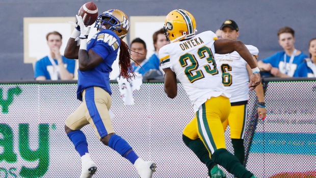 Edmonton Eskimos' Godfrey Onyeka, Winnipeg Blue Bombers' Lucky Whitehead , The Canadian Press Edmonton Eskimos' Godfrey Onyeka, Winnipeg Blue Bombers' Lucky Whitehead