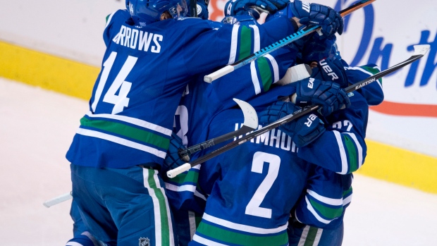 Canucks celebrate, The Canadian Press Canucks celebrate