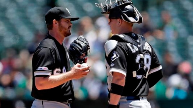 Dylan Covey and Zack Collins, The Canadian Press Dylan Covey and Zack Collins