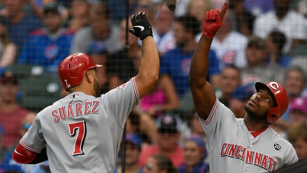 Eugenio Suarez Yasiel Puig, The Canadian Press Eugenio Suarez Yasiel Puig