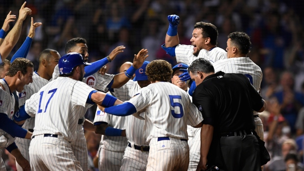Kyle Schwarber, Cubs celebrate, The Canadian Press Kyle Schwarber, Cubs celebrate
