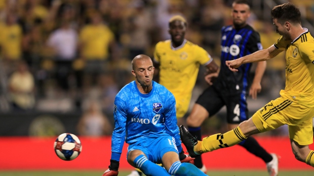 Columbus Crew's Luis Argudo, right, The Canadian Press Columbus Crew's Luis Argudo, right