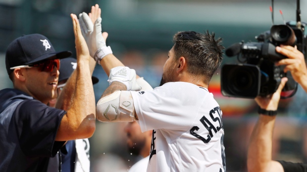 Nicholas Castellanos is congratulated by teammates , The Canadian Press Nicholas Castellanos is congratulated by teammates