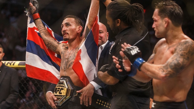 Max Holloway, The Canadian Press Max Holloway
