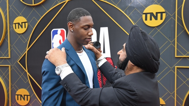 RJ Barrett and Nav Bhatia, Andrew D. Bernstein/NBAE via Getty Images RJ Barrett and Nav Bhatia