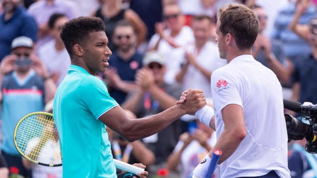 Felix Auger-Aliassime, Vasek Pospisil, The Canadian Press Felix Auger-Aliassime, Vasek Pospisil