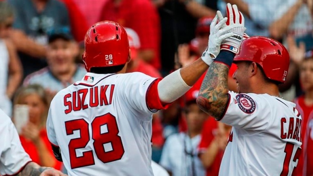 Kurt Suzuki and Matt Adams, The Canadian Press Kurt Suzuki and Matt Adams