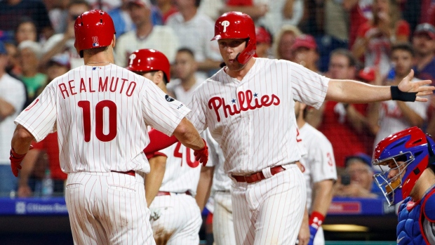 J.T. Realmuto and Rhys Hoskins, The Canadian Press J.T. Realmuto and Rhys Hoskins