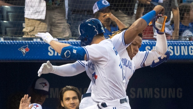 Randall Grichuk and Vladimir Guerrero Jr.