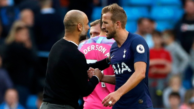 Pep Guardiola and Harry Kane, The Canadian Press Pep Guardiola and Harry Kane
