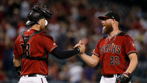 Archie Bradley and Carson Kelly, The Canadian Press Archie Bradley and Carson Kelly