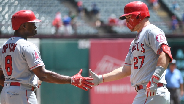 Justin Upton Mike Trout, The Canadian Press Justin Upton Mike Trout