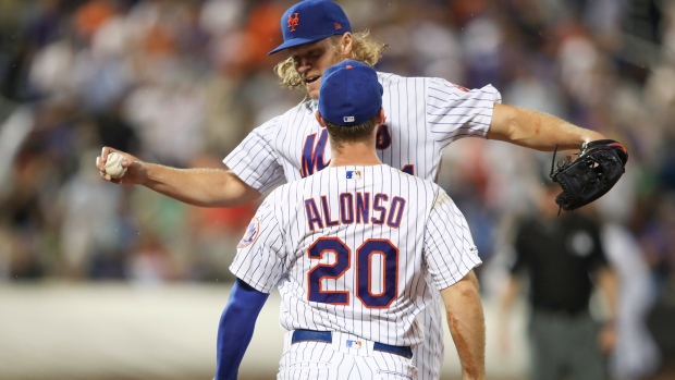 Noah Syndergaard wins Phillies debut in rain-shortened start