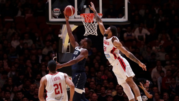 Harrison Barnes (USA) and Khem Birch (Canada), The Canadian Press Harrison Barnes (USA) and Khem Birch (Canada)
