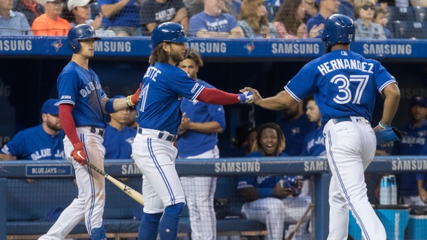 Toronto Blue Jays celebrate, The Canadian Press Toronto Blue Jays celebrate