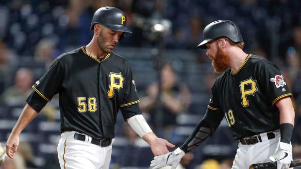 Jacob Stallings, left, is greeted by Colin Moran, The Canadian Press Jacob Stallings, left, is greeted by Colin Moran