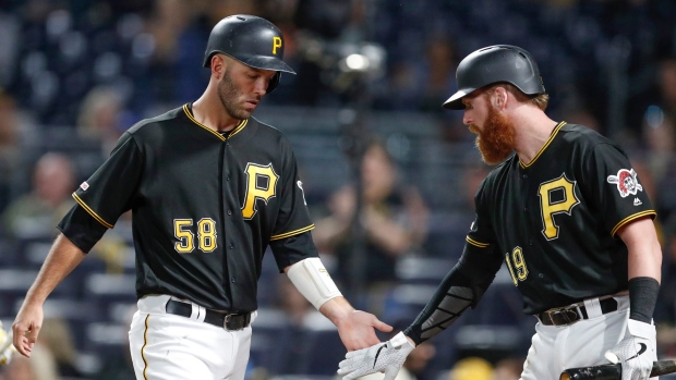 Jacob Stallings, left, is greeted by Colin Moran