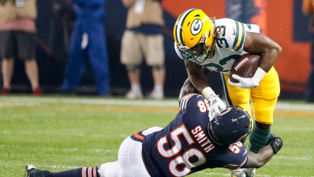 Aaron Jones and Roquan Smith , The Canadian Press Aaron Jones and Roquan Smith
