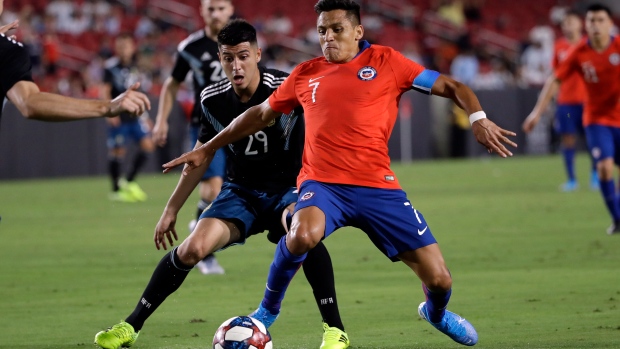 Alexis Sanchez and Exequiel Palacios