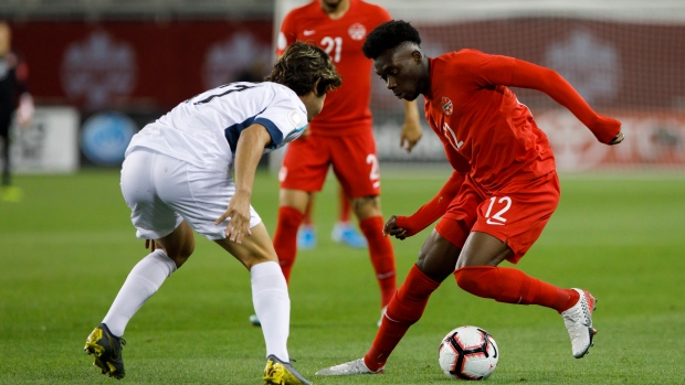Jean Carlos Rodriguez, Alphonso Davies, The Canadian Press Jean Carlos Rodriguez, Alphonso Davies