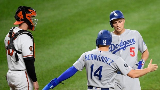 Corey Seager and Enrique Hernandez , The Canadian Press Corey Seager and Enrique Hernandez