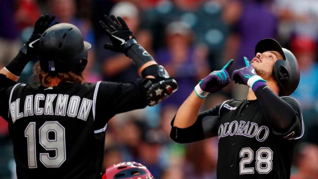 Charlie Blackmon and Nolan Arenado, The Canadian Press Charlie Blackmon and Nolan Arenado