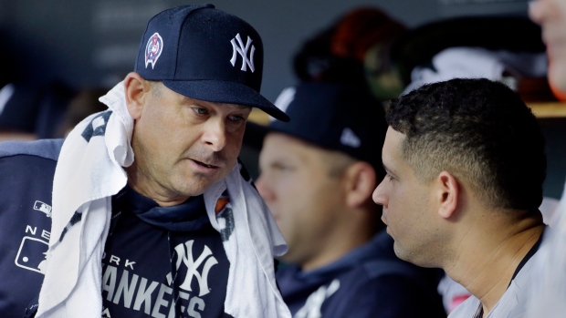 Aaron Boone and Gary Sanchez, The Canadian Press Aaron Boone and Gary Sanchez