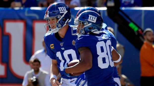 Eli Manning, The Canadian Press Eli Manning
