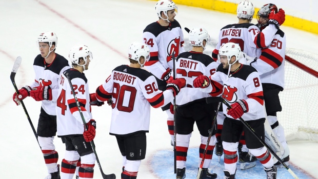 Devils players celebrate