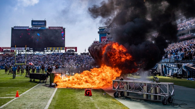 A pyrotechnic accident lights a part of the field on fire before Colts-Titans game