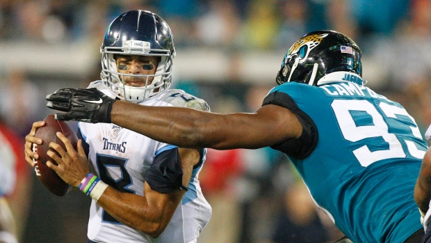 Marcus Mariota and Calais Campbell 