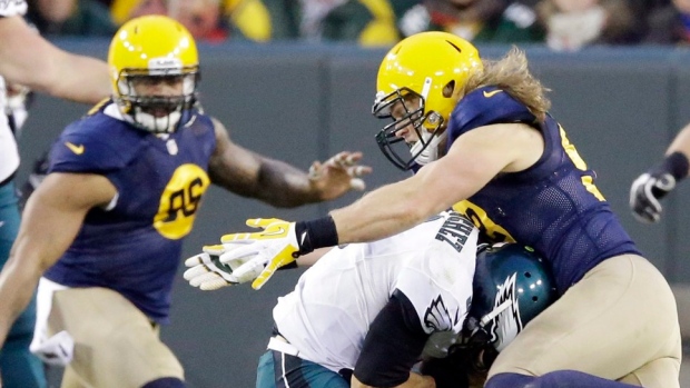 Rodgers throws for 3 scores, Peppers returns INT for TD to lead Packers past Eagles 53-20 Article Image 0, The Canadian Press Rodgers throws for 3 scores, Peppers returns INT for TD to lead Packers past Eagles 53-20 Article Image 0