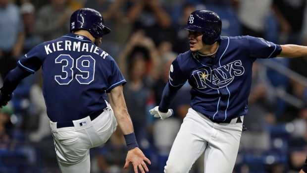 Kevin Kiermaier Willy Adames, The Canadian Press Kevin Kiermaier Willy Adames