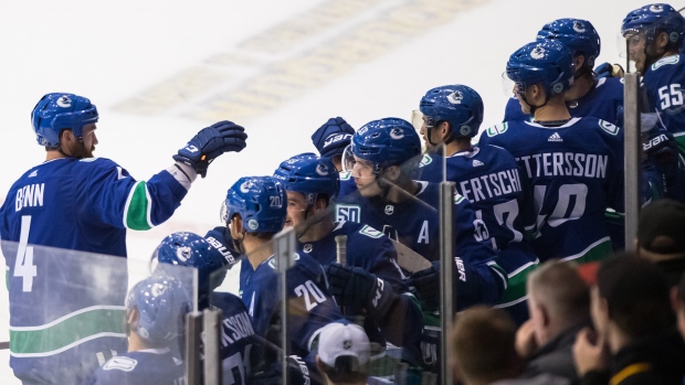 Vancouver Canucks celebrate, The Canadian Press Vancouver Canucks celebrate