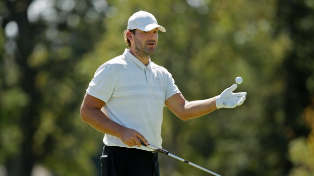 Tony Romo, The Canadian Press Tony Romo