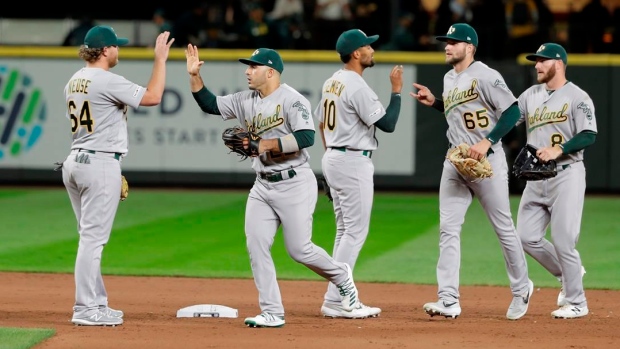 All 10 MLB playoff slots filled; A's, Rays in, Cleveland out - TSN