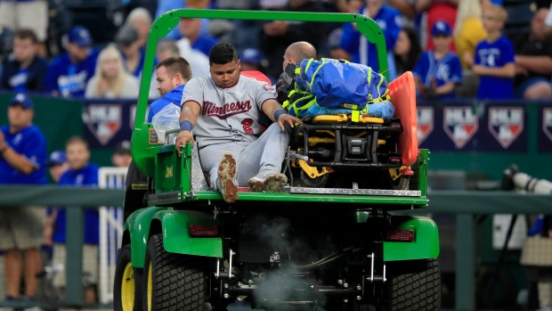 Luis Arraez carted off , The Canadian Press Luis Arraez carted off