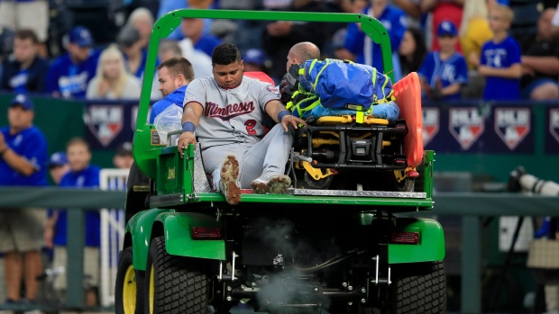 Luis Arraez carted off 