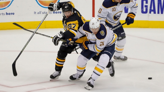 Sidney Crosby Kyle Okposo, The Canadian Press Sidney Crosby Kyle Okposo