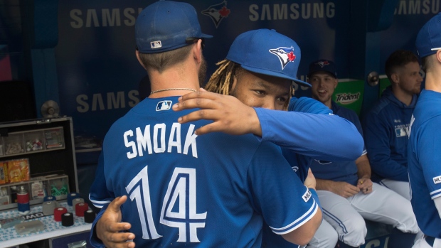 Justin Smoak,  Vladimir Guerrero Jr.