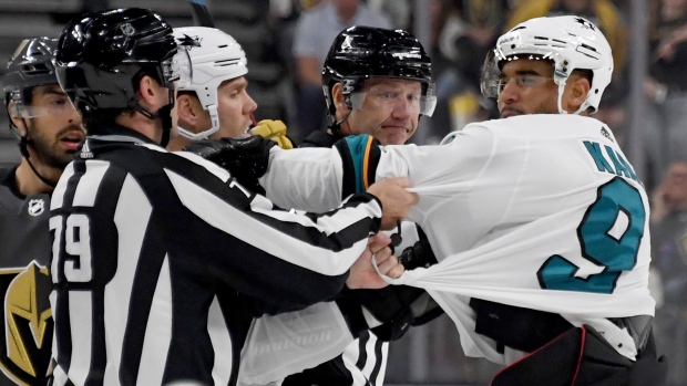 Evander Kane linesman Kiel Murchison, Ethan Miller/Getty Images Evander Kane linesman Kiel Murchison